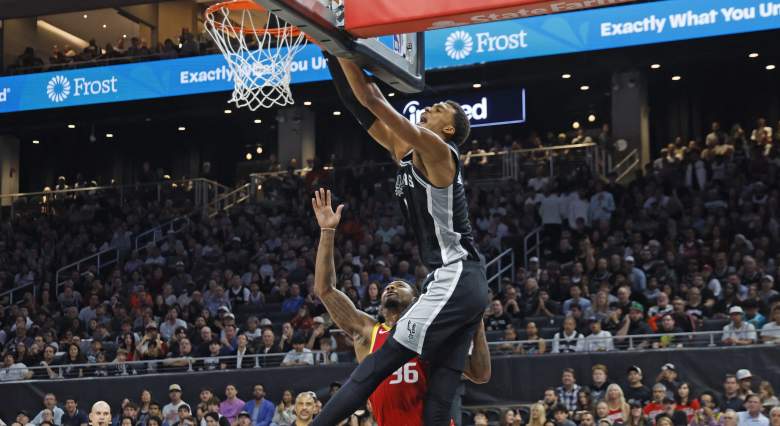 Spurs center Victor Wembanyama dunking against the Rockets