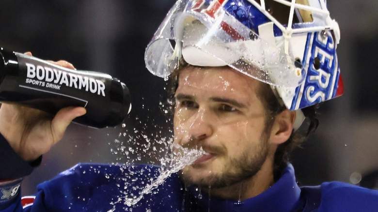 Igor Shesterkin #31 of the New York Rangers takes a second period water break