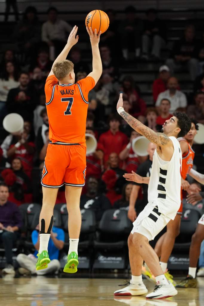 Stefan Vaaks is attempting a jump shot against Cincinnati