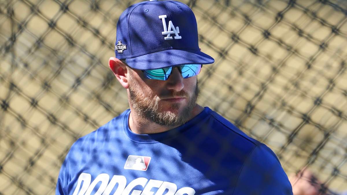 Max Muncy #13 of the Los Angeles Dodgers looks on