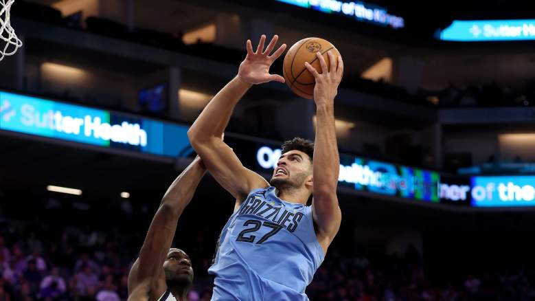 Cam Boozer shooting a layup