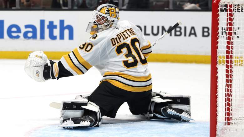 Michael DiPietro #30 of the Boston Bruins reacts to a shot