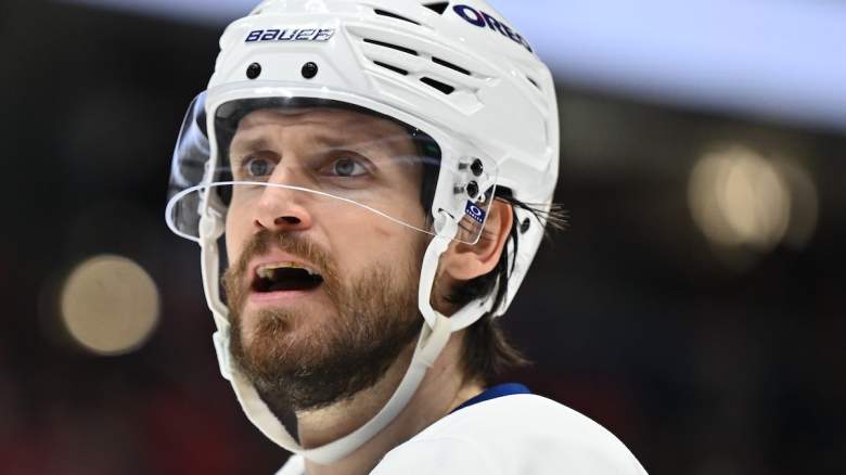 Oliver Ekman-Larsson #95 of the Toronto Maple Leafs questions a referee