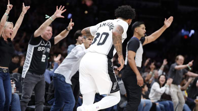 San Antonio Spurs guard Julian Champagnie celebrating after making a three
