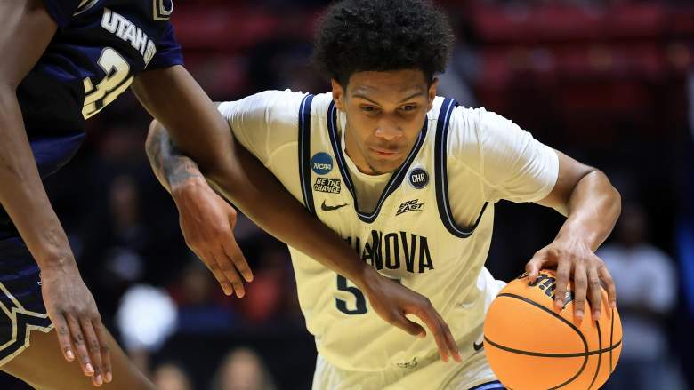 Villanova guard Acaden Lewis dribbling by defender