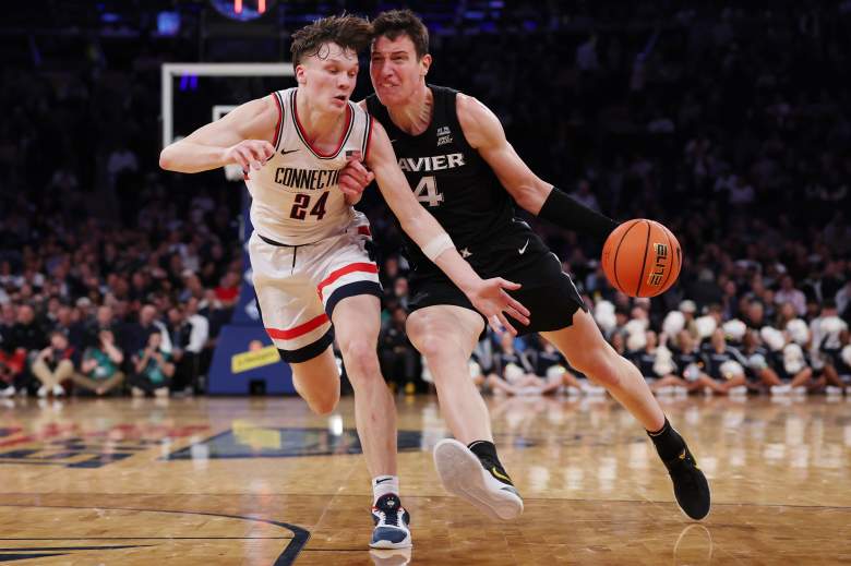 NCAA; Filip Borovicanin driving to the basket against UCONN