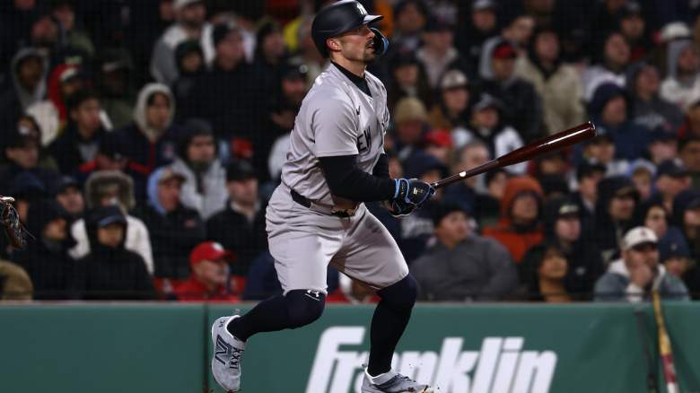 Randal Grichuk #34 of the New York Yankees watches his RBI double