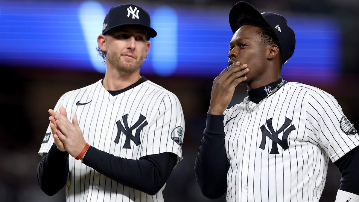 Ryan McMahon #19 and Jazz Chisholm Jr. #13 of the New York Yankees talk