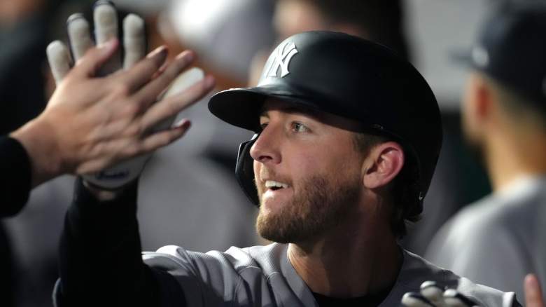 Ryan McMahon #19 of the New York Yankees celebrates his two-run home run